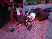 Motorcyclist dies in collision with parked lorry, family seriously injured