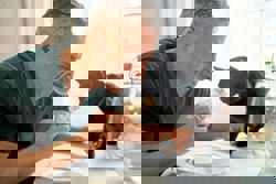 Cats meow harder to get a man's attention