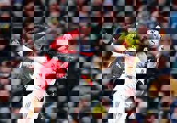 Soccer-Cunha strikes as Man Utd snatch point in 1-1 draw at Leeds