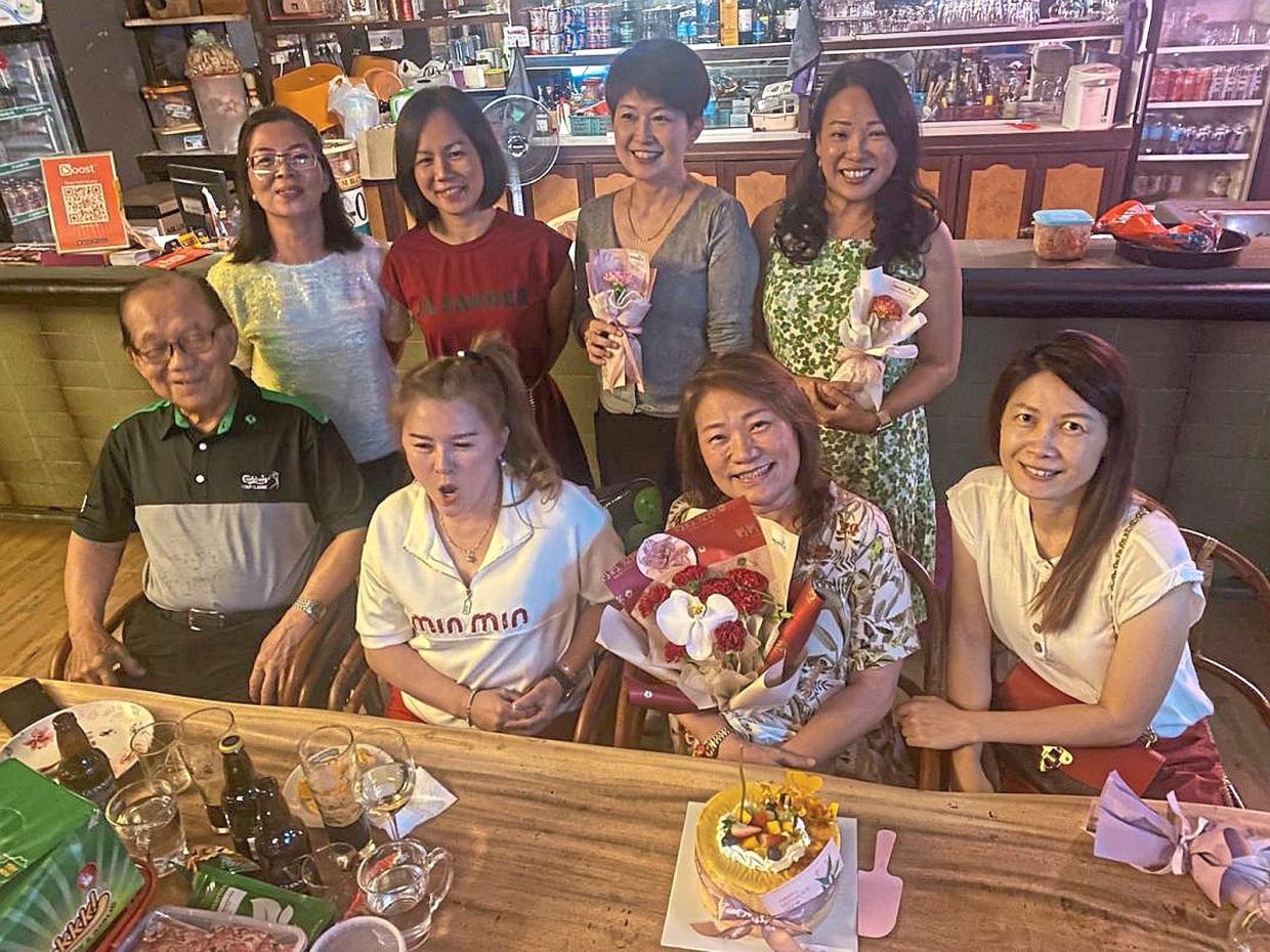 The club’s women members celebrating Mother’s Day with past president Datuk Dr Soon Choon Teck (seated left).