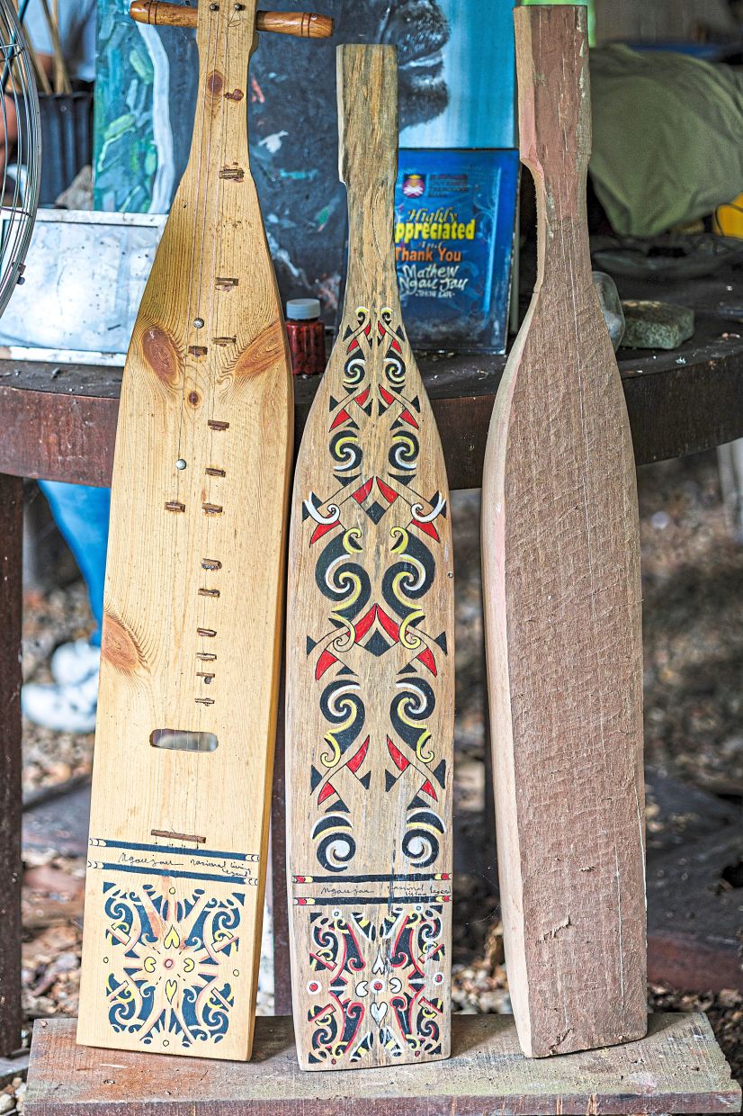 A row of unfinished sape instruments at Mathew’s workshop.