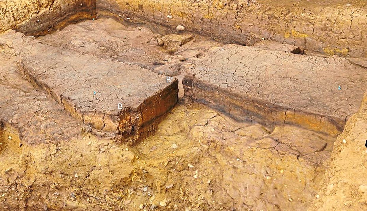 Excavation of the ancient campfire at an archaeological site near the village of Barnham in England. – AP