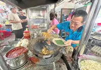 ‘Foreign workers essential to hawker food preparation’