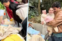 Tourist couple leave babies with China guard to explore; locals play with twins, change nappies