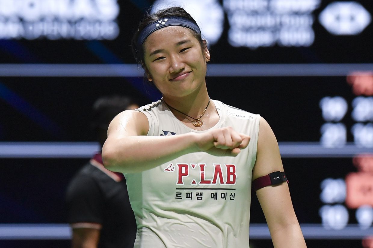 Keep the smile: South Korea women’s singles shuttler An Se-young reacts after winning over Canada’s Michelle Li at Malaysian Open. — IZZRAFIQ ALIAS/The Star