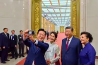 South Korea's Lee snaps Xi selfie with Chinese 'backdoor' phone