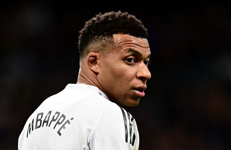 Soccer-Mbappe ruled out of Super Cup semi v Atletico as Real name squad