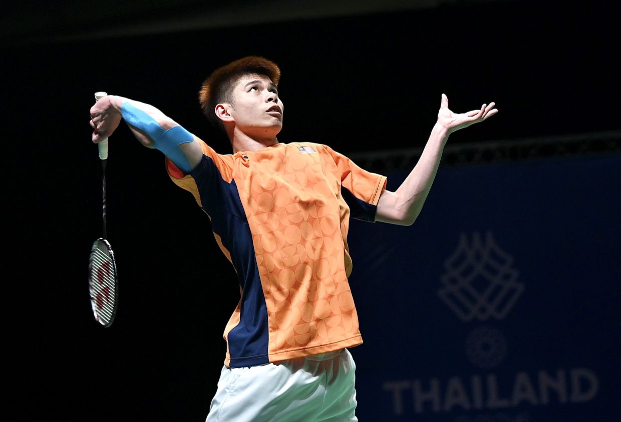 Fired-up Jun Hao beats China's Wang to keep hopes alive