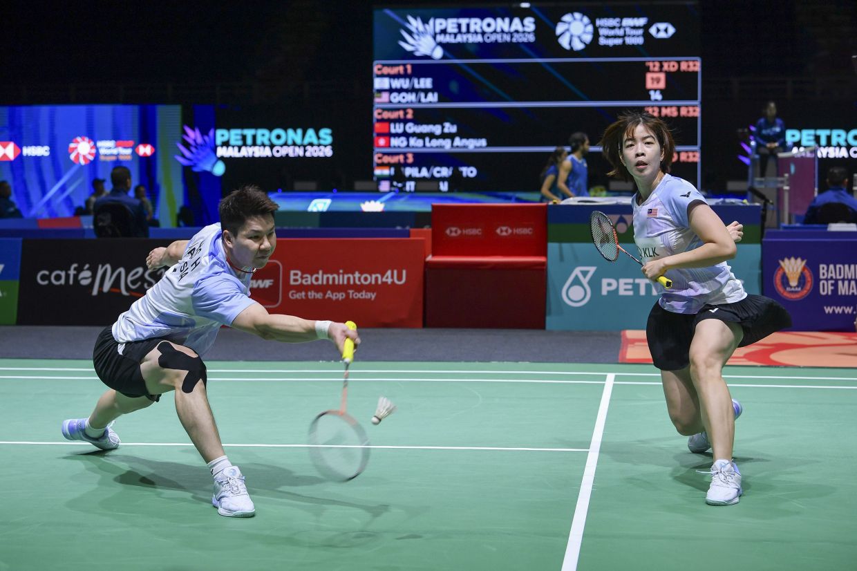 Malaysia's mixed doubles shuttlers Goh Soon Huat-Shevon Lai Jemie in action in the home Open. — IZZRAFIQ ALIAS/The Star