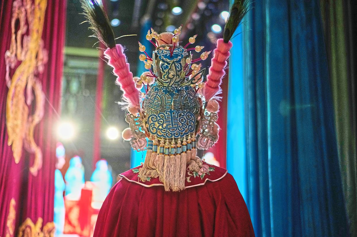 A close-up reveals the intricate details of a Peking opera actor’s headgear. Photo: AP