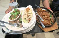 Experts: Raise food waste awareness first, implement laws later