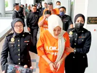 Bribery probe nets senior officer