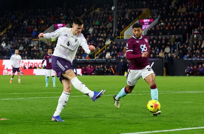 Soccer-Sesko double but Man United held to 2-2 draw at lowly Burnley