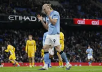 Soccer-Arsenal get title boost as Man City and Villa both drop points