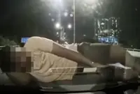 Motorcyclist goes into oncoming traffic, crashes into car