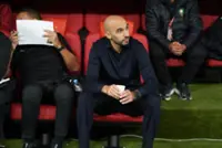 Soccer-Morocco coach fights off critics as tournament tension mounts