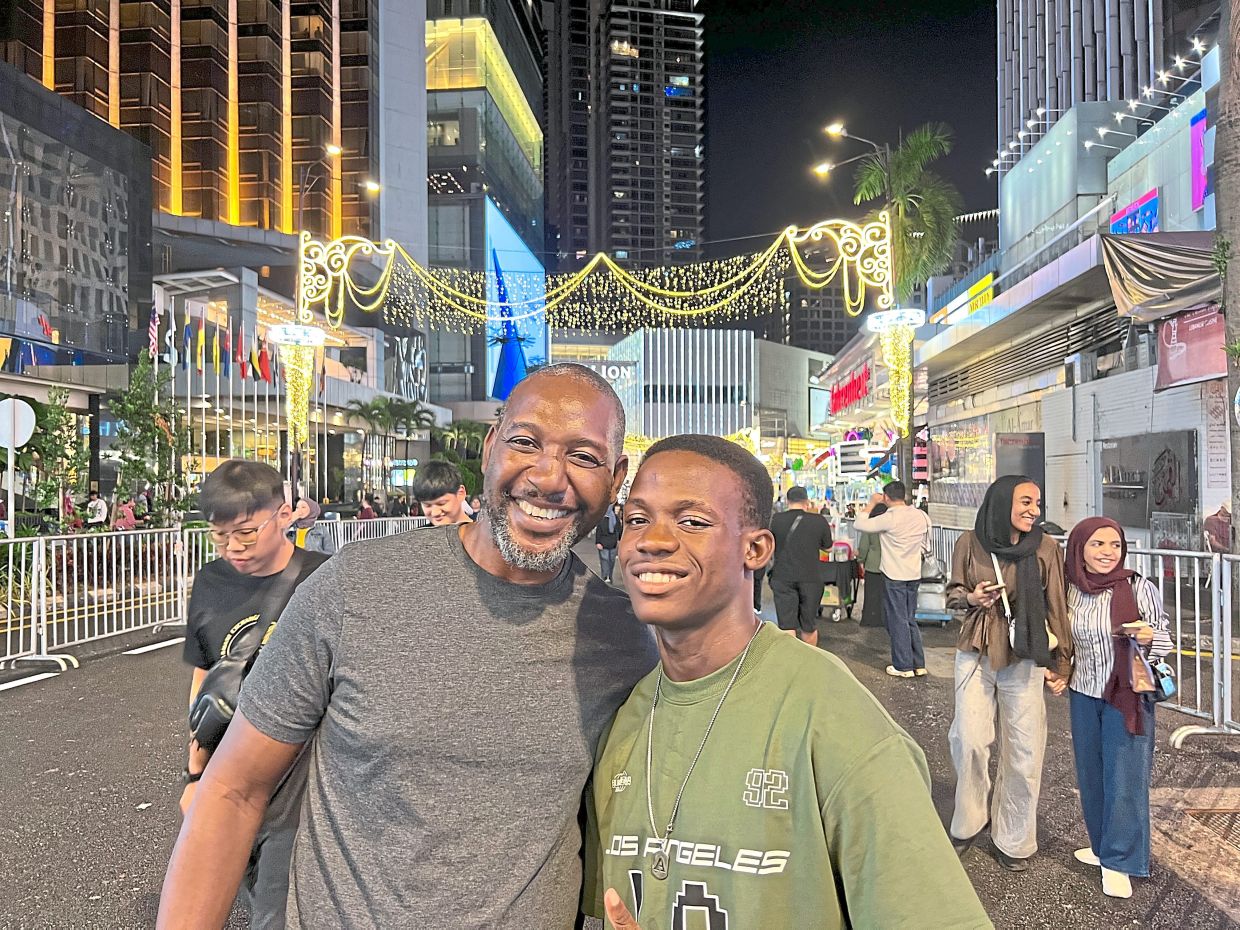 Visiting Malaysia for the first time, Kanbasha (left) and his son Anopa were impressed by the atmosphere of the event.