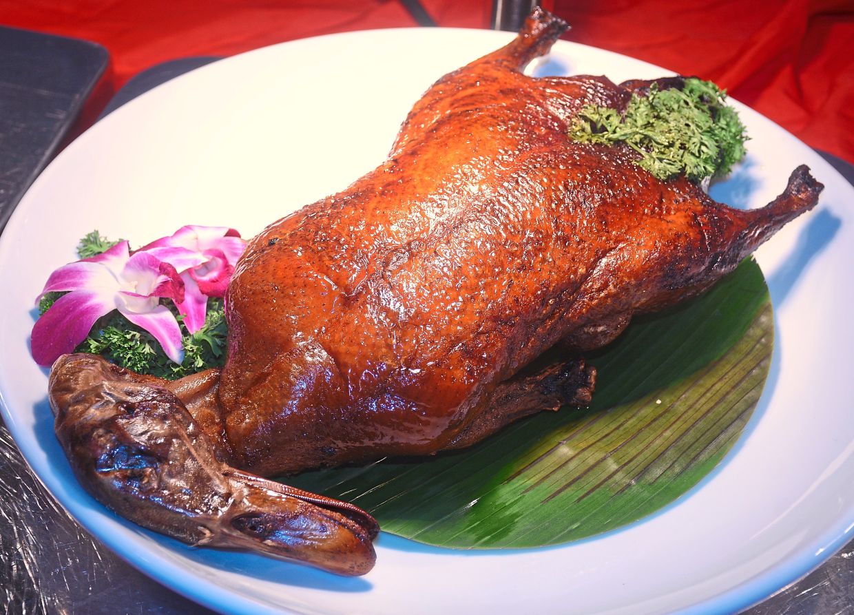 The signature E&O Roasted Duck is a best-seller every year.