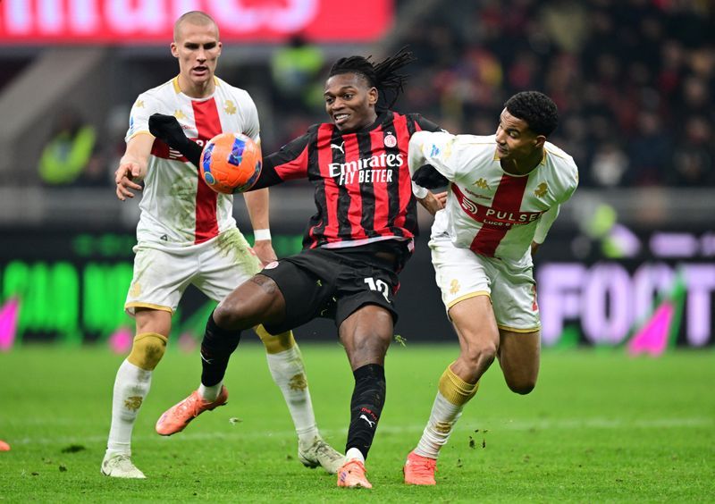 Soccer-Milan salvage unbeaten run in dramatic draw with Genoa