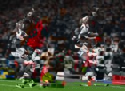 Soccer-Lacklustre Arsenal held to dour 0-0 draw by Liverpool