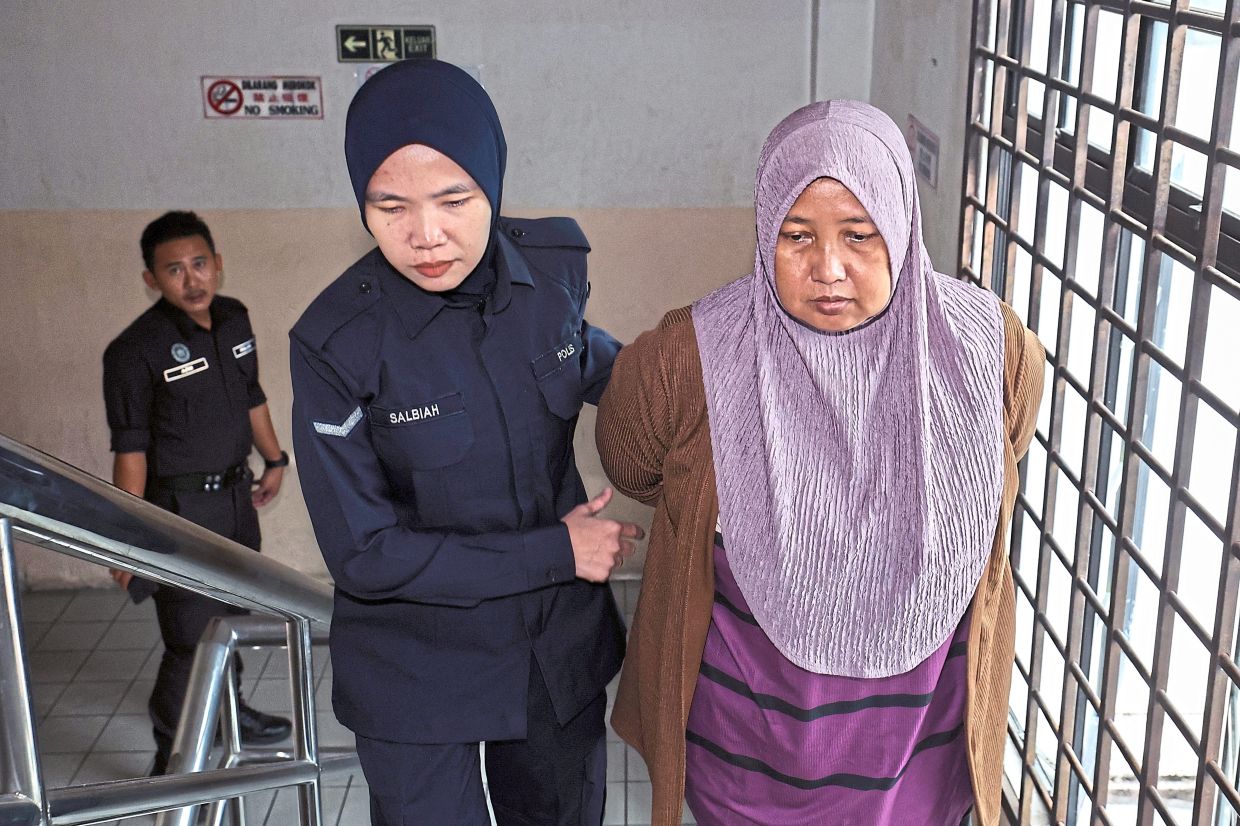 Woman charged with murder of boy