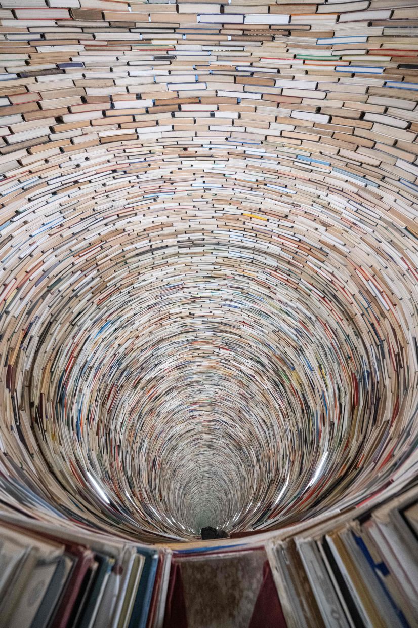 A pile of 8,000 books installed in Prague's city library in 1998 has become the Czech capital's latest tourist hit, drawing thousands hungry for selfies in a social media craze. Photo: AFP