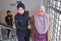 Woman charged with murder of boy