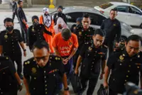 Gold bars among items seized in raid