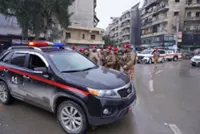 Syrian security forces say some Kurdish fighters left Aleppo, others still holed up