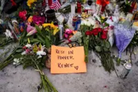 Tens of thousands protest in Minneapolis over fatal ICE shooting