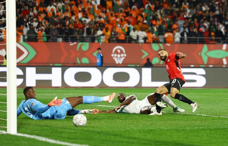 Soccer-Marmoush, Salah strike as Egypt edge out holders Ivory Coast in quarter-final