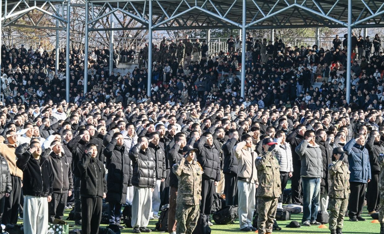 New conscripts take part in a ceremony at a boot camp in Nonsan, South Chungcheong Province, to mark the camp's reception of recruits for the first time this year, Jan 5. - Photo: Army