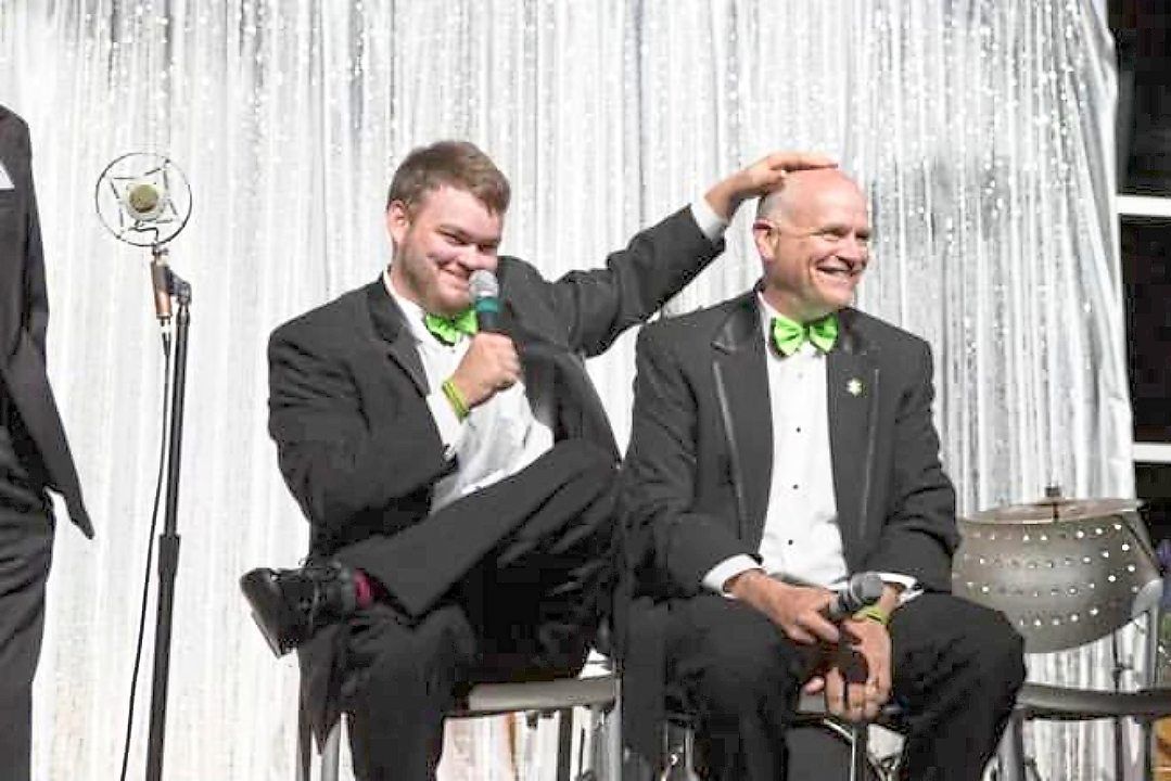 Tyler (left) showing love in his own playful way with his father. — Ron_fournier/Instagram