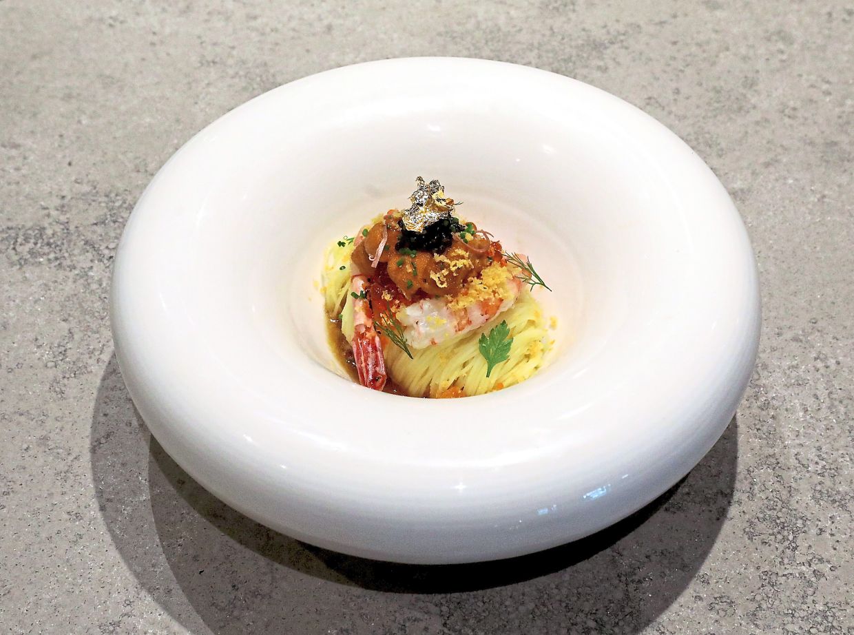 The cold capellini delivers both riotous fun and confident elegance in one hugely satisfying meal. — SAMUEL ONG/The Star