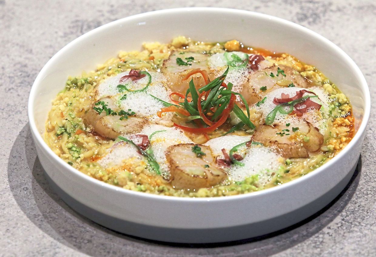 Hokkaido scallops and orzo pasta make for a mouth-watering combination. — SAMUEL ONG/The Star
