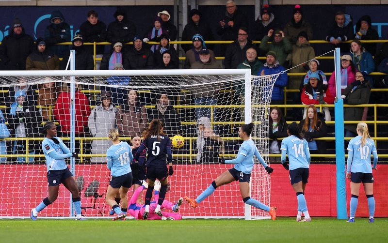 Soccer-Man City stay top of WSL, Chelsea keep pressure on