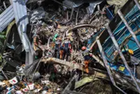 'This is an impossible task' - Hopes wane for survivors in Philippine garbage site collapse
