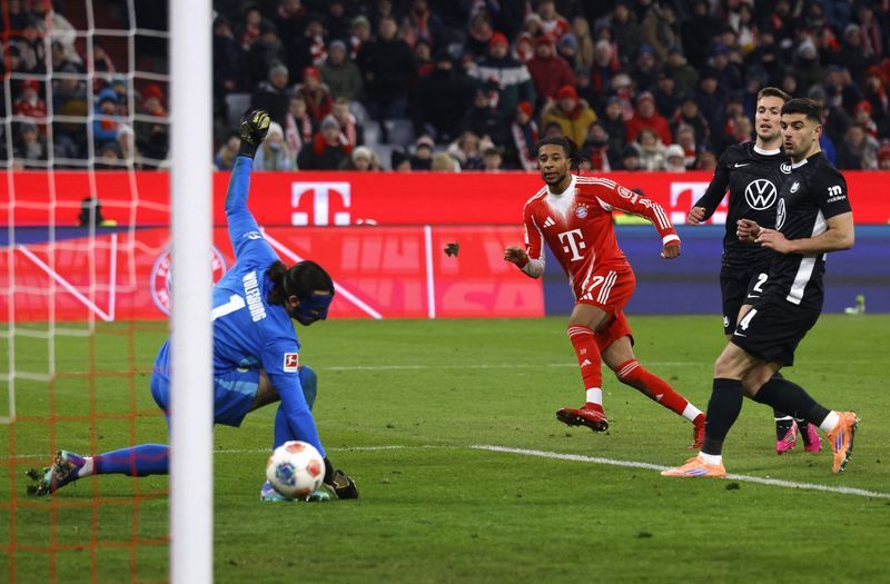 Soccer-Bayern crush own-goal kings Wolfsburg 8-1 to stretch lead at top
