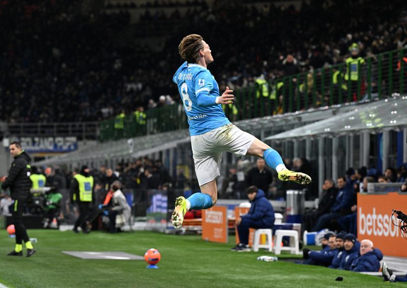 Soccer-McTominay double earns champions Napoli away draw with leaders Inter