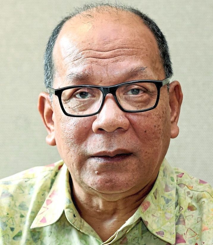 Izham says community gardens encourage residents to produce their own food while strengthening neighbourly bonds.