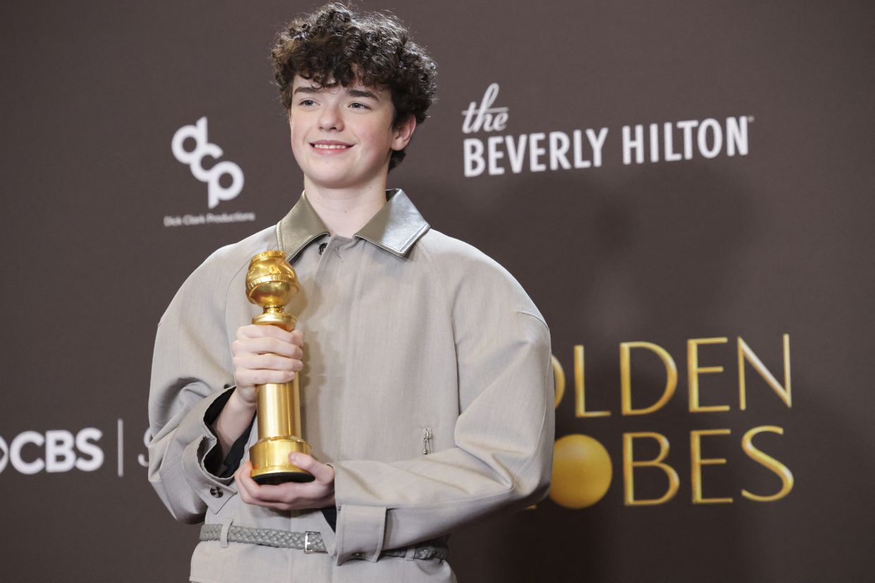 Owen Cooper poses with the Best Performance by a Male Actor in a Supporting Role on Television award for 'Adolescence' at the 83rd Annual Golden Globes in Beverly Hills, California, US, Jan 11, 2026. Photo: Reuters
