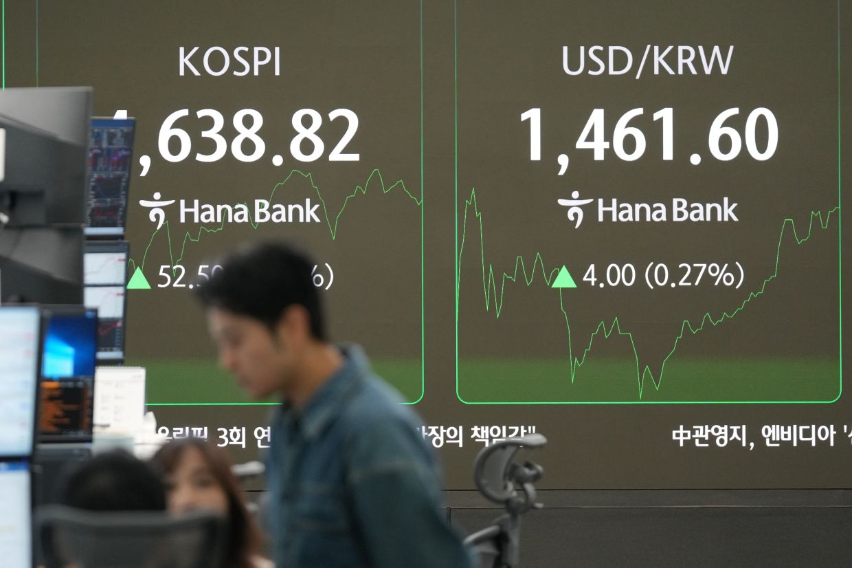 S.Korea, Taiwan stocks rally on AI optimism; Trump-Powell feud clouds outlook