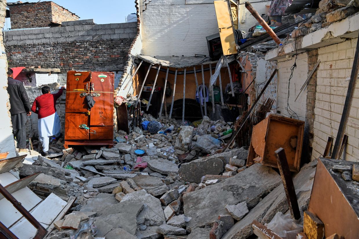 Bride and groom among eight killed in gas cylinder blast at wedding in Pakistan’s capital