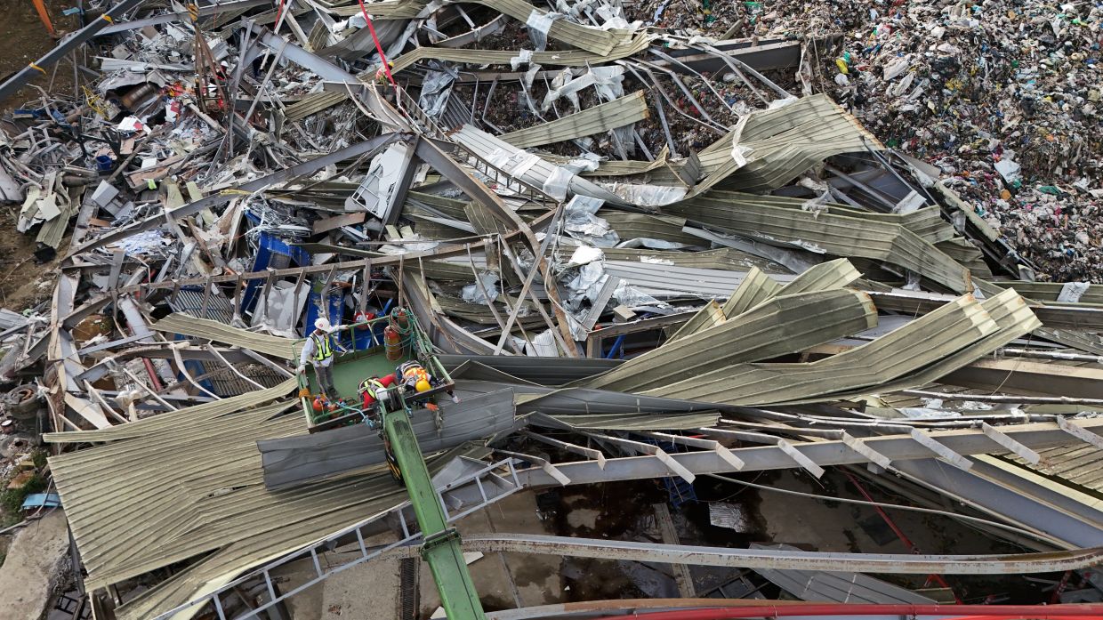 Death toll from landfill collapse in the Philippines rises to eight