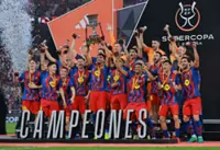Soccer-Raphinha strikes twice as Barcelona edge Real Madrid in heated Spanish Super Cup final