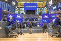 Earnings season, inflation data pose test for resilient US stocks