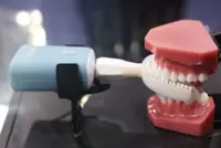 Health-tracking toothbrushes, mouth guards lure consumers with audacious claims