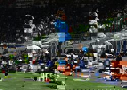 Soccer-McTominay double earns champions Napoli away draw with leaders Inter