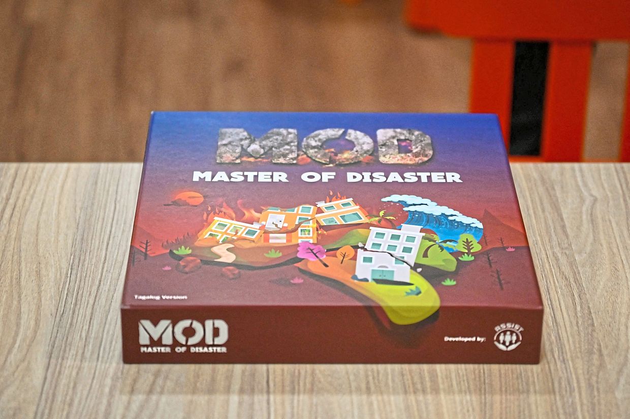 Training for the worst: Master of Disaster, a board game about disaster preparedness. — AFP