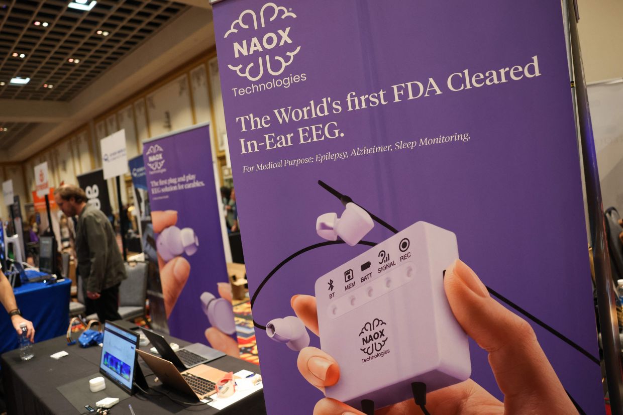 The NAOX Technologies In-Ear EEG for brain health is displayed during Pepcom ahead of the 2026 Consumer Electronics Show (CES) in Las Vegas, Nevada. — AFP